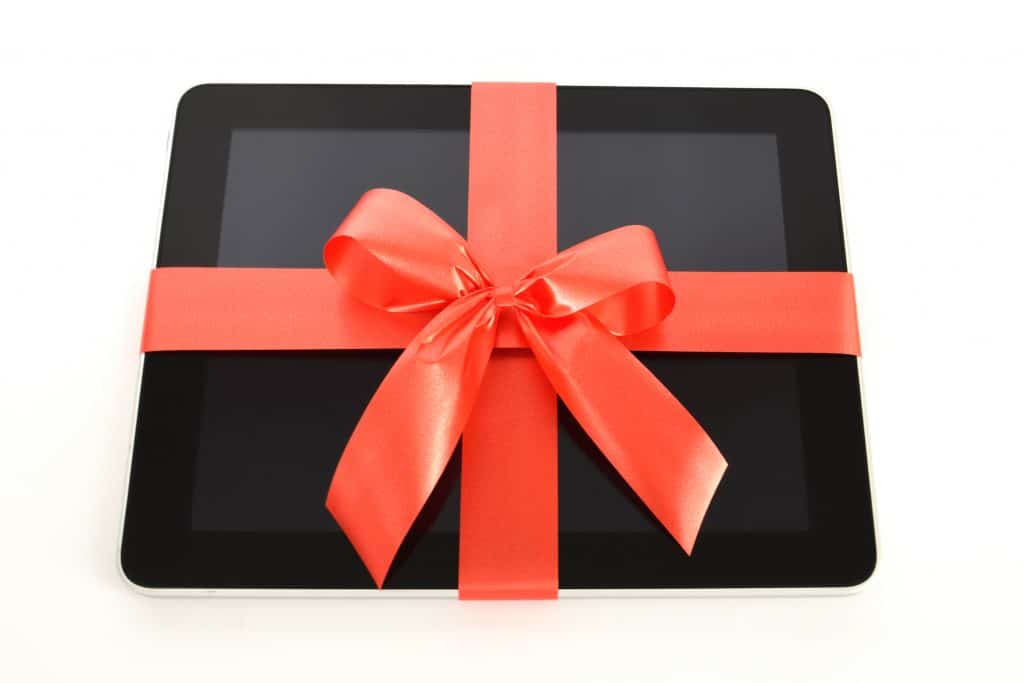 Digital tablet with red ribbon