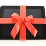 Digital tablet with red ribbon