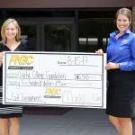 FNBC presents sponsorship check for golf tournament