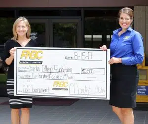 FNBC presents sponsorship check for golf tournament