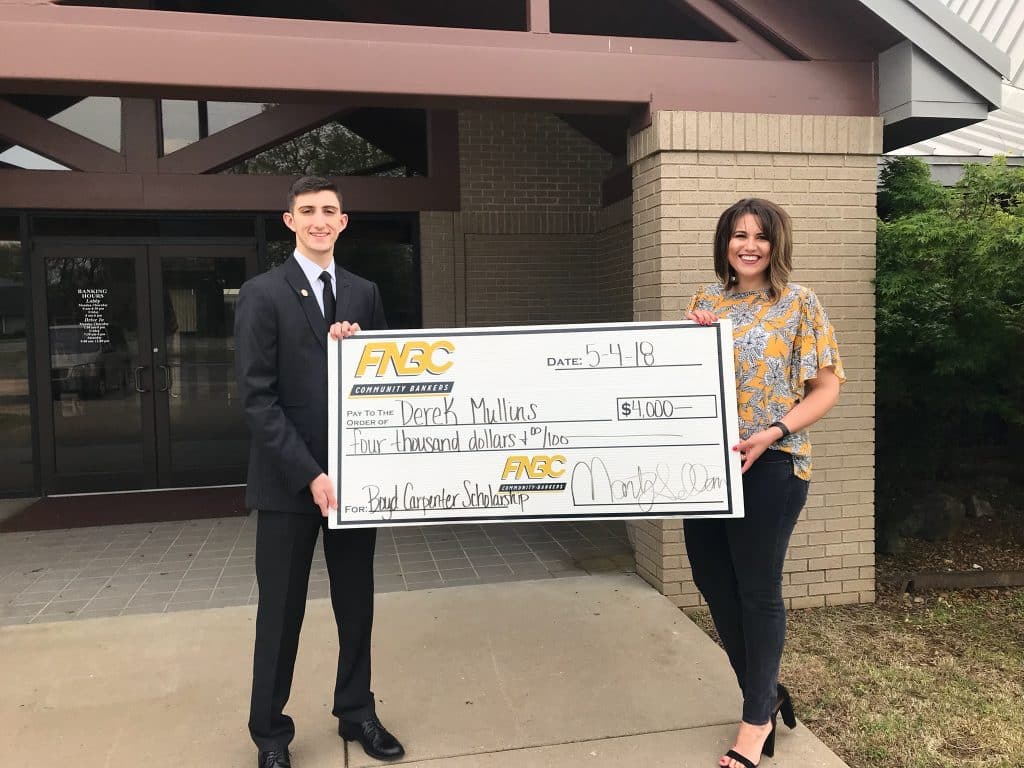 Derek Mullins, a 2018 graduate of Highland High School, is presented with the Boyd Carpenter Scholarship from FNBC by Molly Carpenter, Vice President of Marketing & Public Relations at FNBC. Boyd was Molly’s grandfather and is the late-President and Chairman of the Board of FNBC. Boyd's strong support of education led FNBC to create the scholarship in his name over 30 years ago.