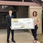 Derek Mullins, a 2018 graduate of Highland High School, is presented with the Boyd Carpenter Scholarship from FNBC by Molly Carpenter, Vice President of Marketing & Public Relations at FNBC. Boyd was Molly’s grandfather and is the late-President and Chairman of the Board of FNBC. Boyd's strong support of education led FNBC to create the scholarship in his name over 30 years ago.